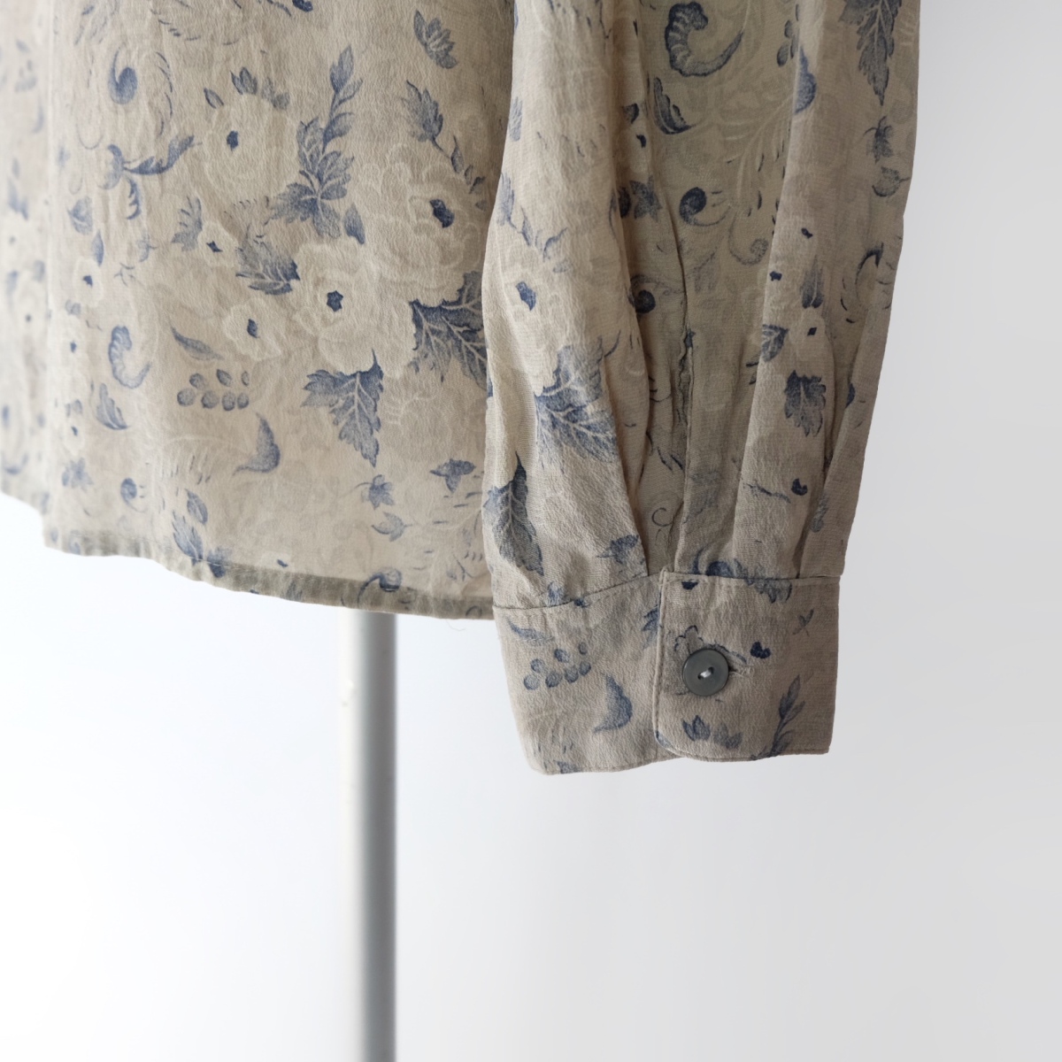Collarless floral print silk blouse